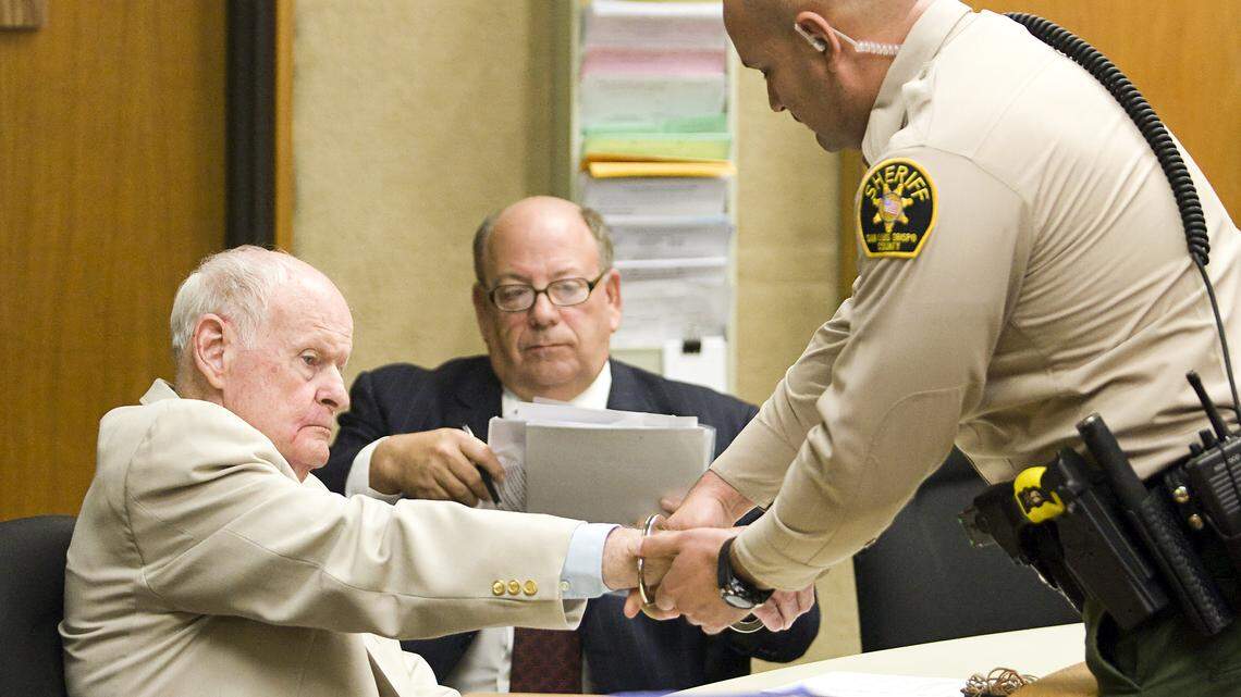 Al Moriarty is taken into custody after his sentencing in September. His lawyer, Jeff Stulberg, sits next to him.