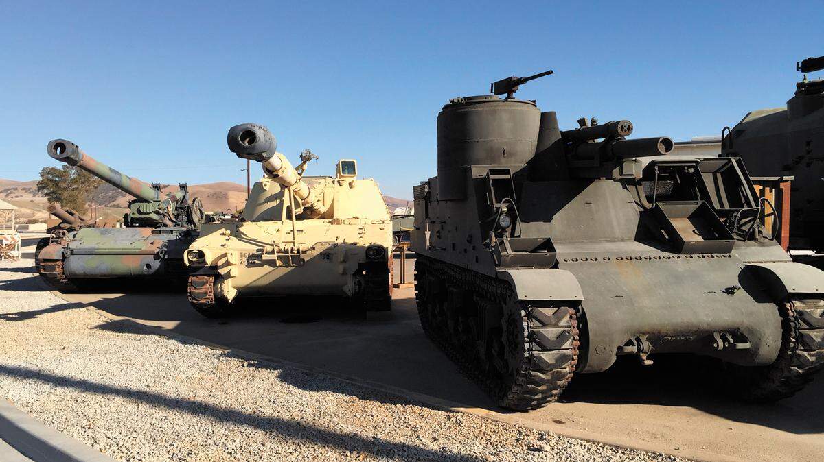 Military vehicles are lined up outside the Camp Roberts Historical Museum Annex.