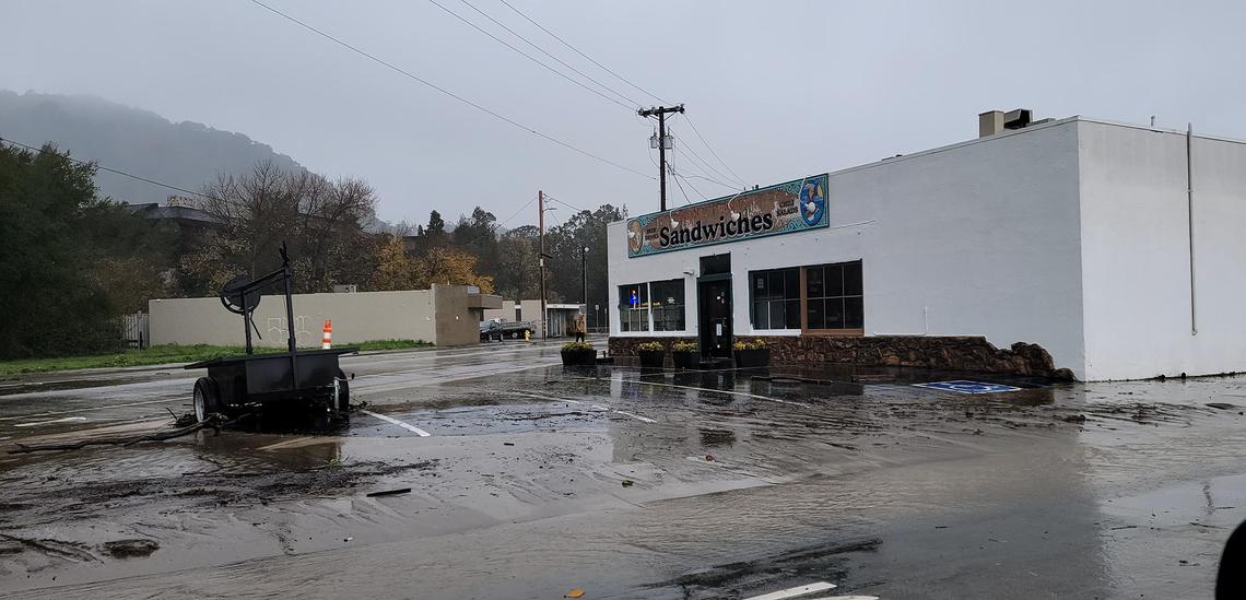 Business along South Higuera Street at South Street in San Luis Obispo were hit with flood water, mud and debris.