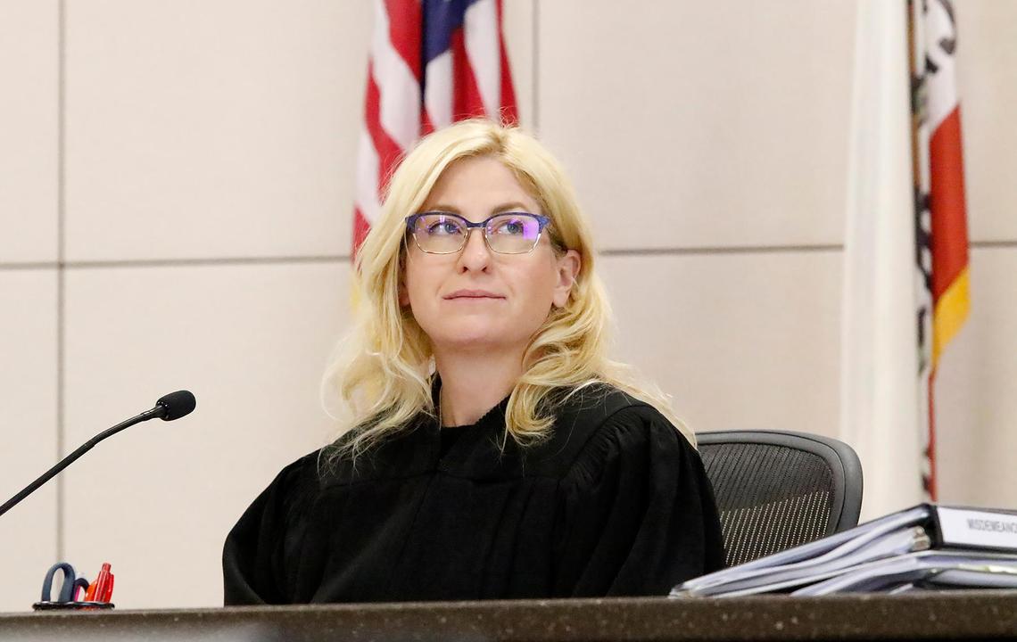 Monterey County Superior Court Judge Jennifer J. O’Keefe glances at a slide of a photo of evidence in court in Salinas on Monday, Sept. 19, 2022, during the Kristin Smart murder trial.