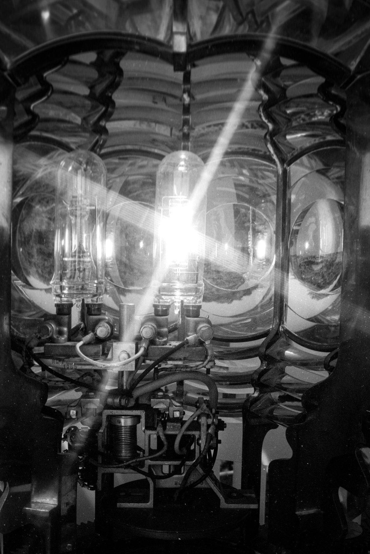 The 4th order Fresnel lens was shipped from France and was originally lit by an oil lamp. Later it had a 1,000 watt electric globe which has a beam of three-quarters of a million candlepower.The Coast Guard was winding down manned operations at the Point San Luis Light House when the Telegram-Tribune reporter and photographer visited Oct 18, 1973. Automated operation was slated for summer of next year.
