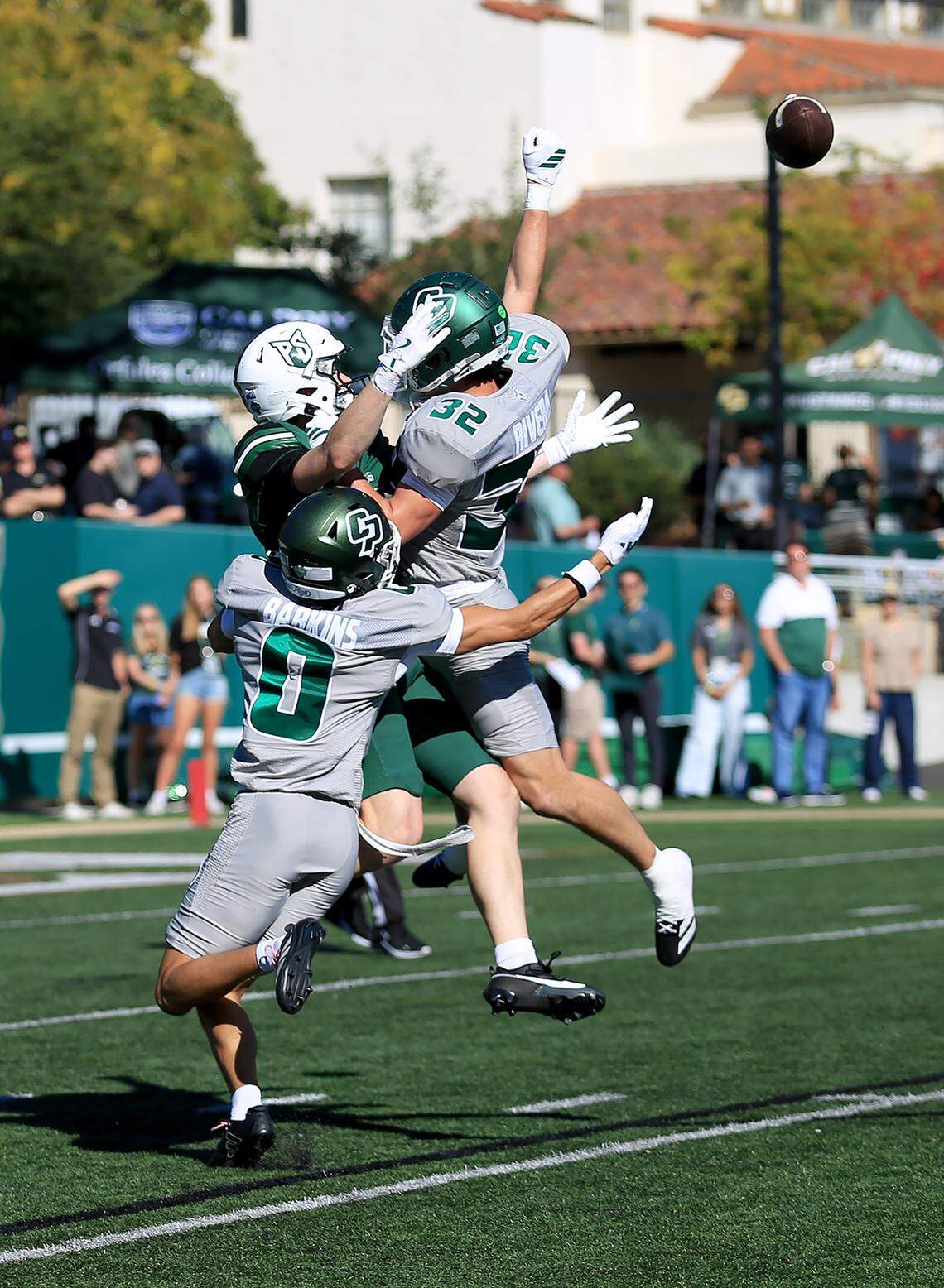 It's a free-for-all to catch a pass. Cal Poly fell to Portland State 40-35 in a college football game at Mustang Memorial Field on Nov. 1, 2025.