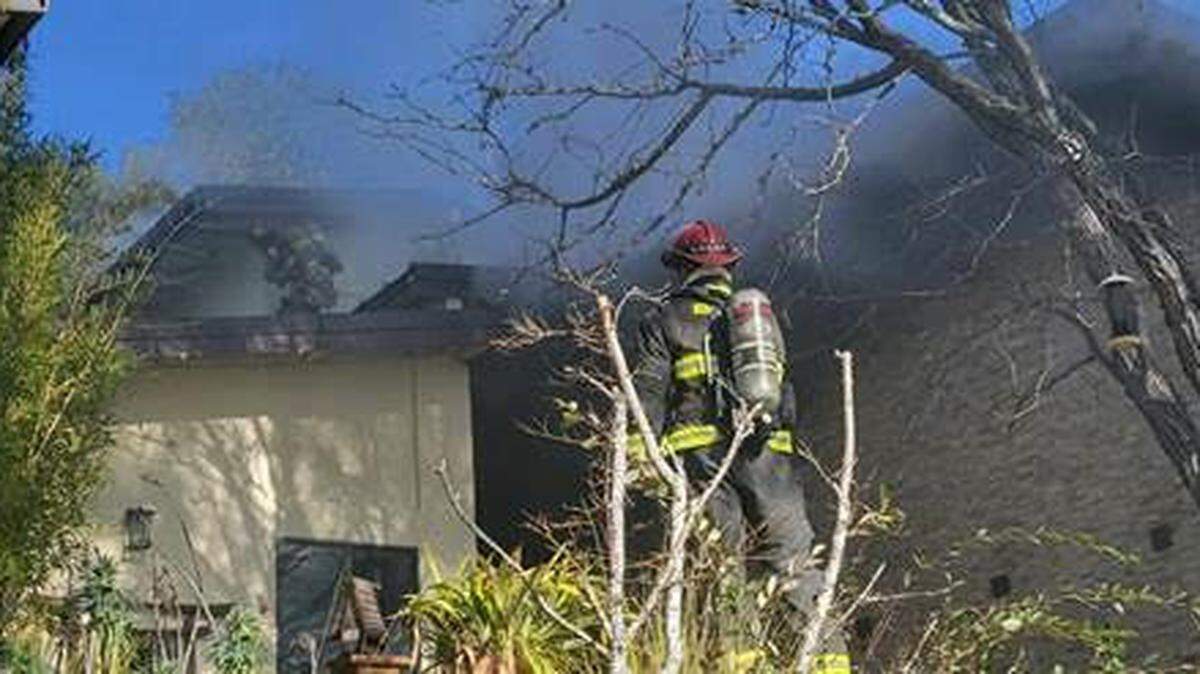 Atascadero Fire and Emergency Services responded to a residential fire Friday morning, extinguishing the flames before the home was fully engulfed and preventing other buildings from being impacted.