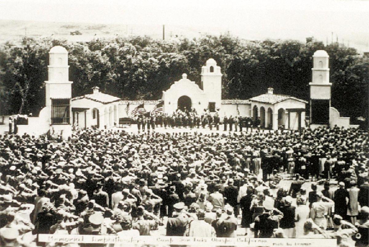 A World War II-era image shows crowds of soldiers filling the Camp San Luis Obispo amphitheater next to Chorro Creek. The Mission-style stage was designed by Young Louis of San Luis Obispo and hosted luminaries such as Bing Crosby and Bob Hope.