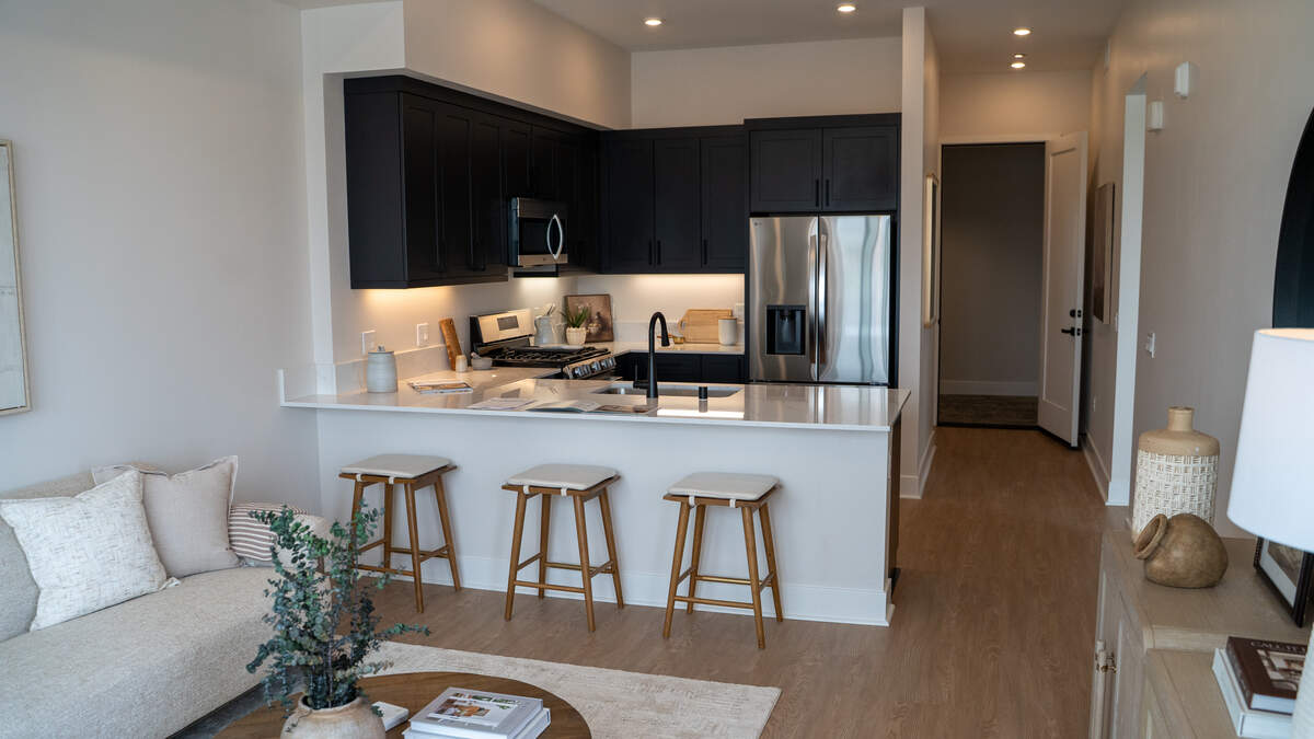 A model one-bedroom unit was on display during the grand opening of the 59-unit “Encore” project on West Grand Avenue on Saturday, June 13, 2026. Visitors were invited to tour the lobby, rooftop, units and amenities of both buildings.