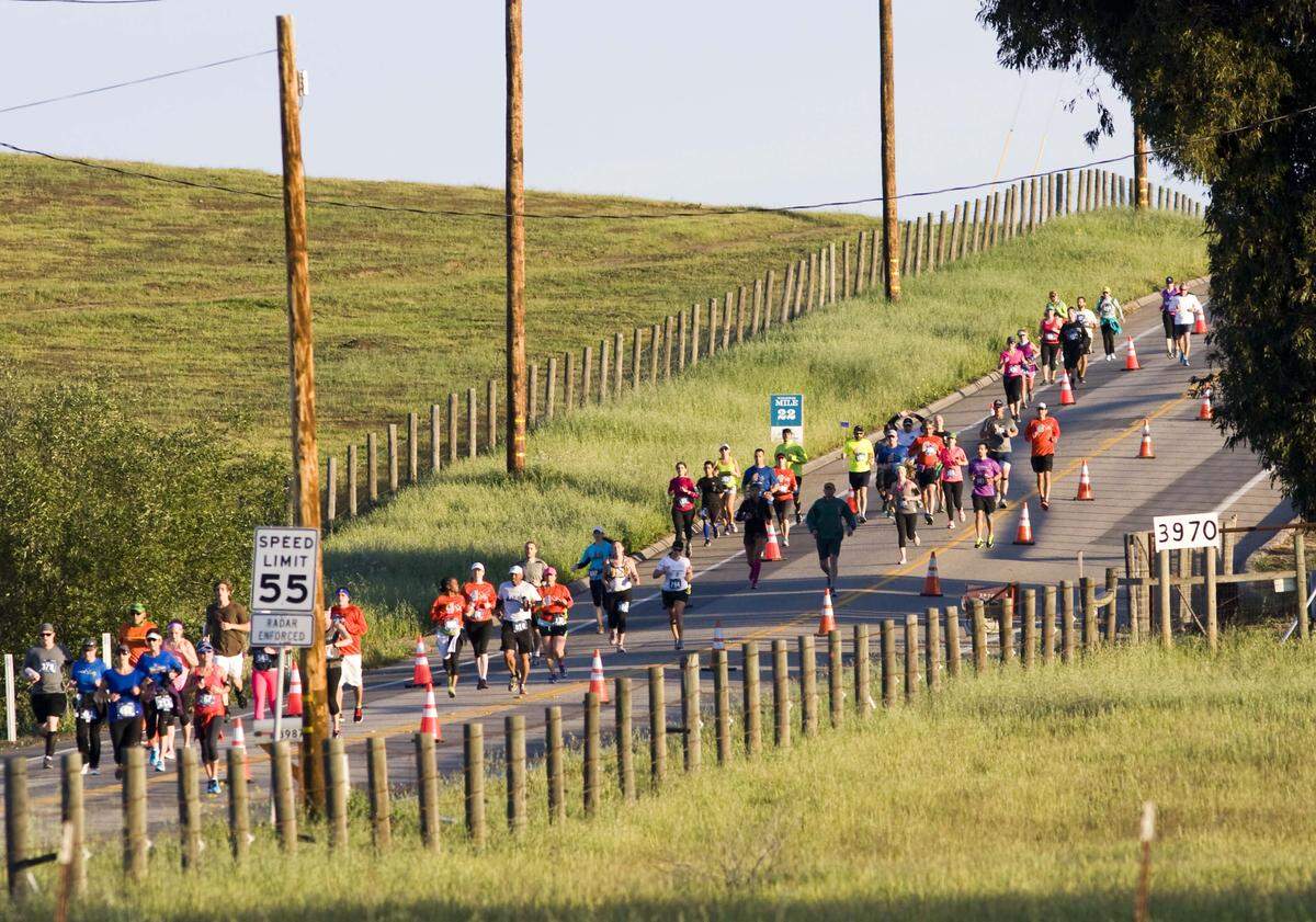 Runners participate in the San Luis Obispo Marathon and Half-Marathon on Sunday, April 27, 2014. The race was canceled in 2020.