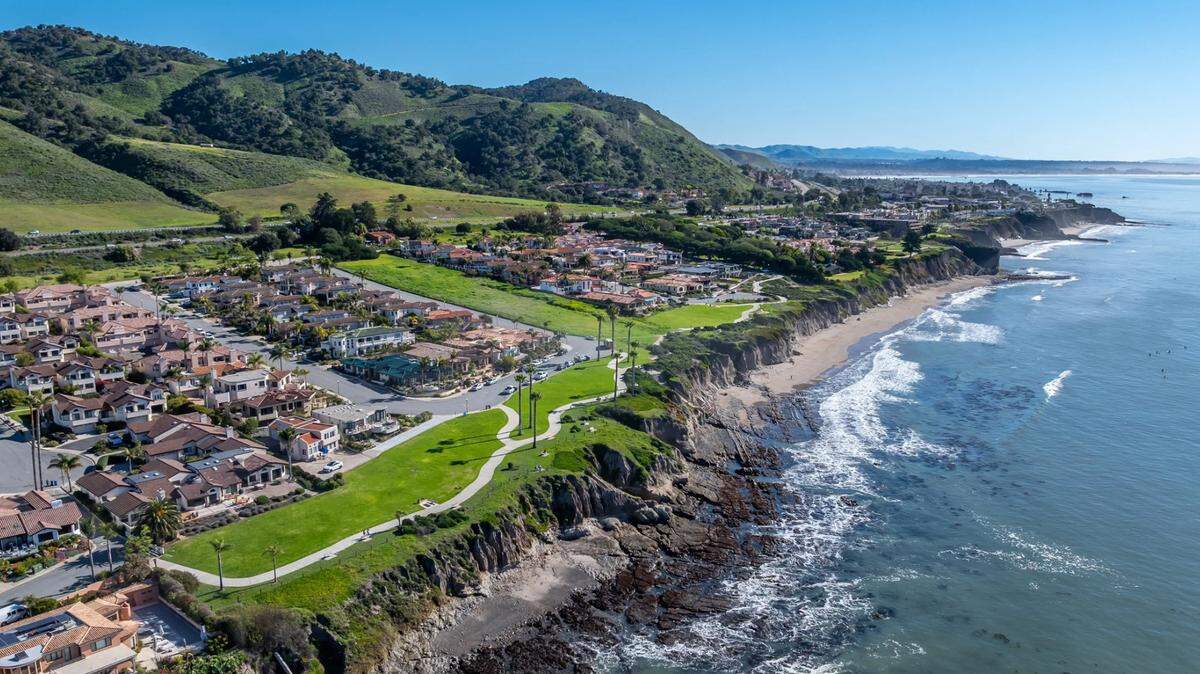 The Solemar housing project, located on the green strip of open land at center, will consist of eight custom homesites, 12 townhomes and a pair of homes for the McNeal family, which owns the property, pictured here on Tuesday, May 12, 2026.