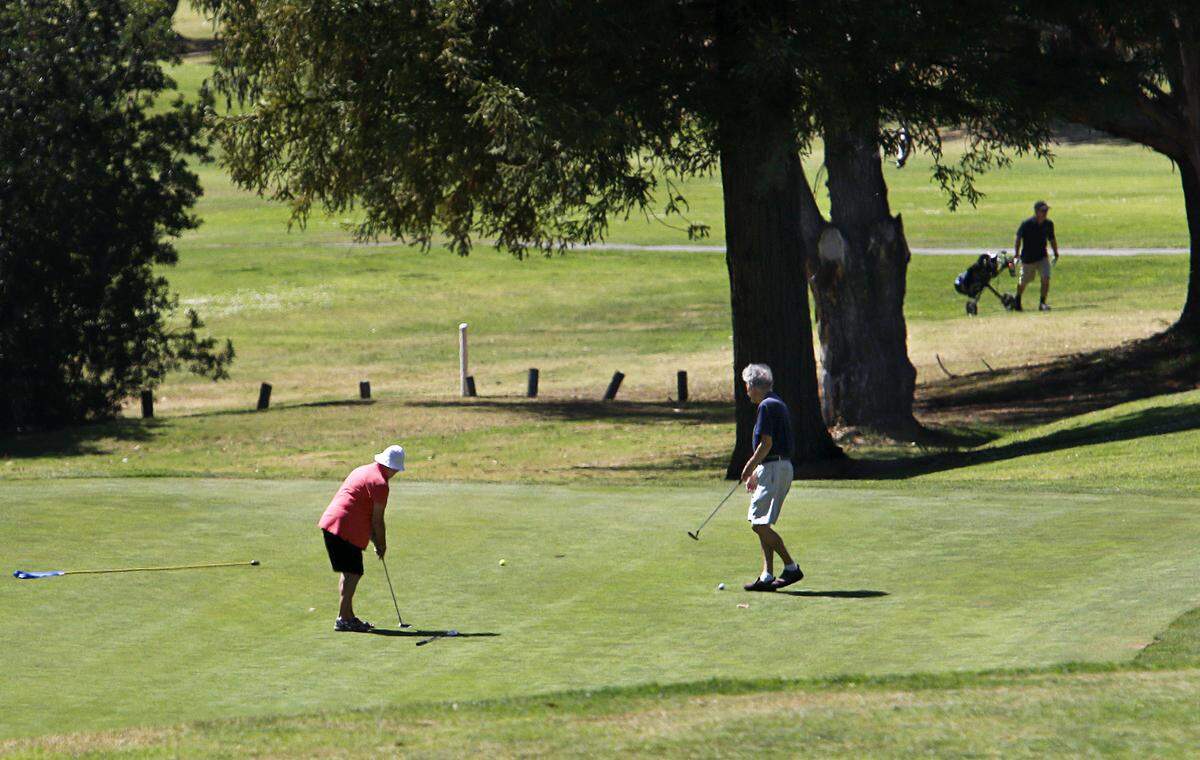 Golfers take to the links at Blacklake Golf Resort in Nipomo.