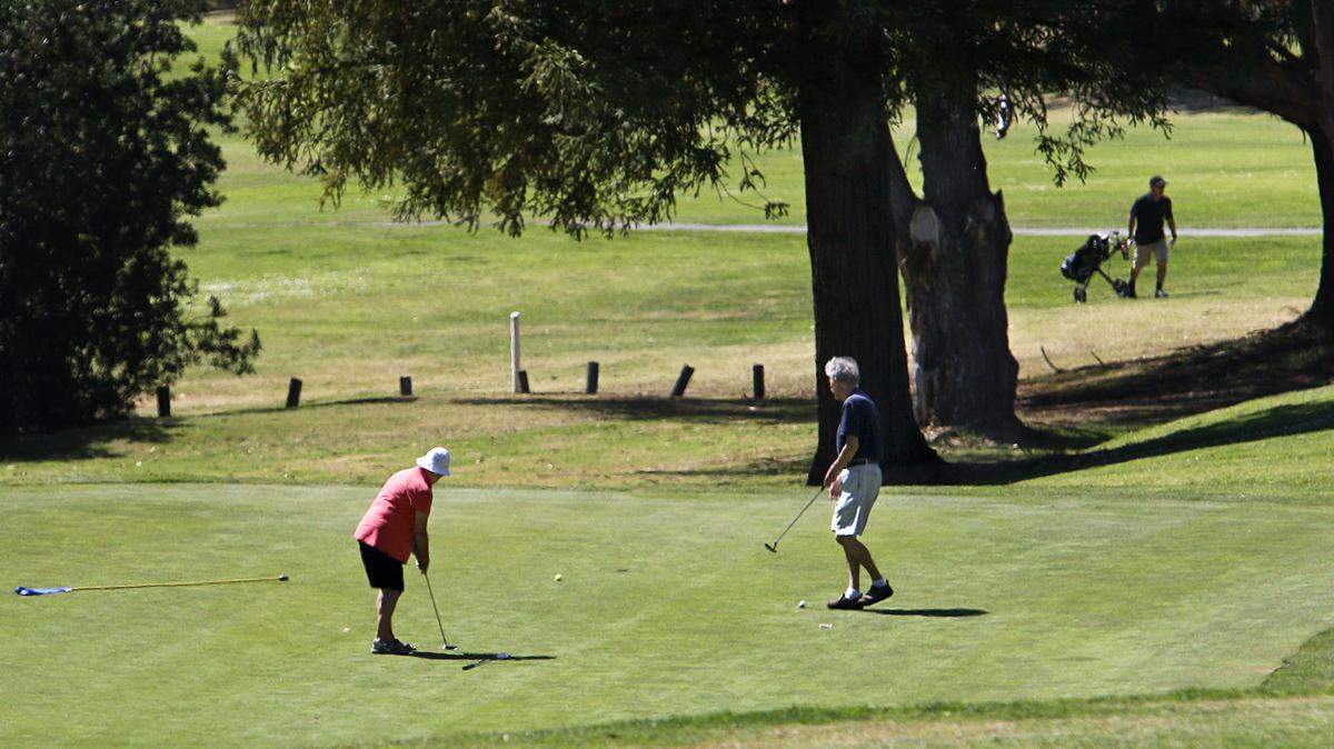Golfers take to the links at Blacklake Golf Resort in Nipomo.