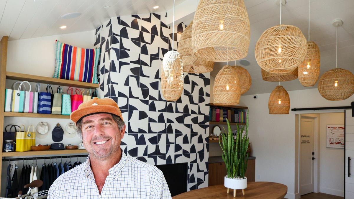 Ryan and Marisa Fortini have done a ground-up renovation of a Cayucos motor lodge, creating the Pacific Motel. Ryan stands in the lobby on Sept. 20, 2022.