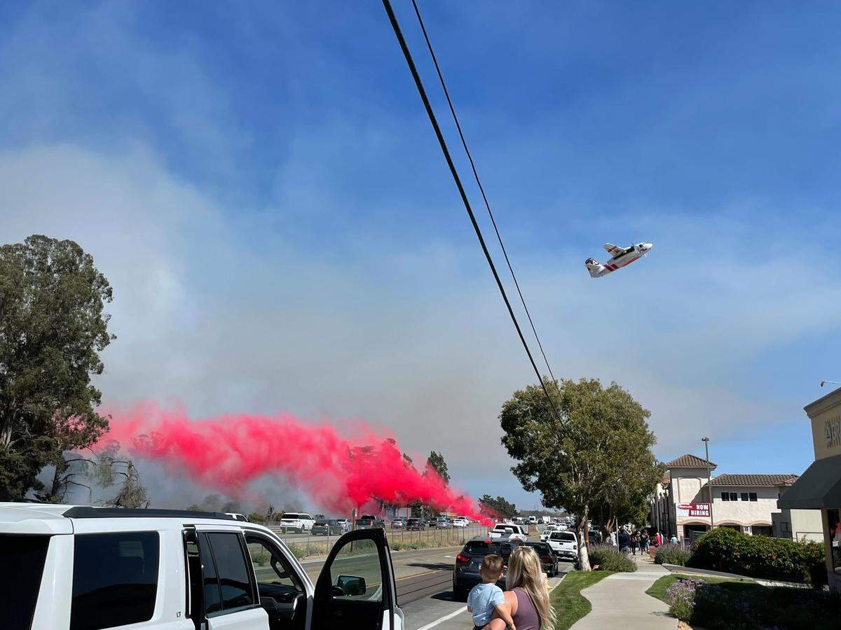 A fire burning along Highway 101 in Nipomo brought traffic to a stand-still on July 15, 2022.