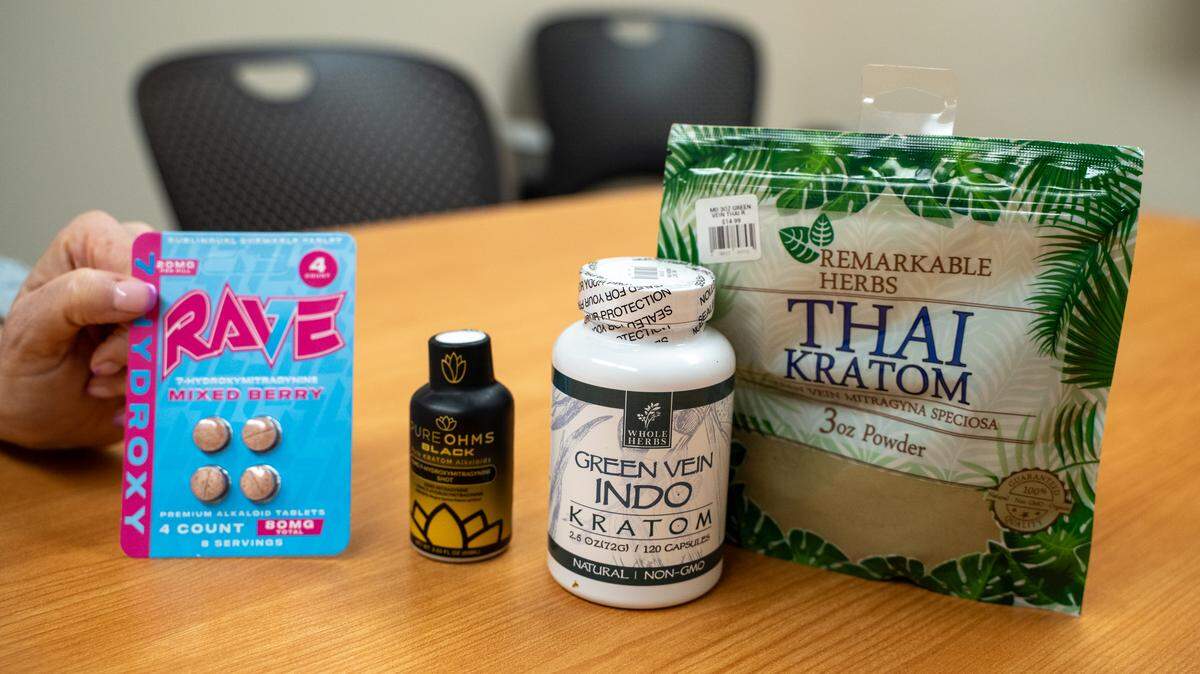 San Luis Obispo County tobacco control program manager Amy Gilman displays kratom products that contain a high concentration of 7-hydroxymitragynine on the left and natural, sub-2% 7-OH concentration kratom products on the right at the Public Health Department's offices on Thursday, May 21, 2026. Kratom products with concentrations higher than 2% 7-OH have been linked to opioid addiction, causing the state and local jurisdictions to begin restricting the sale of these products this year.