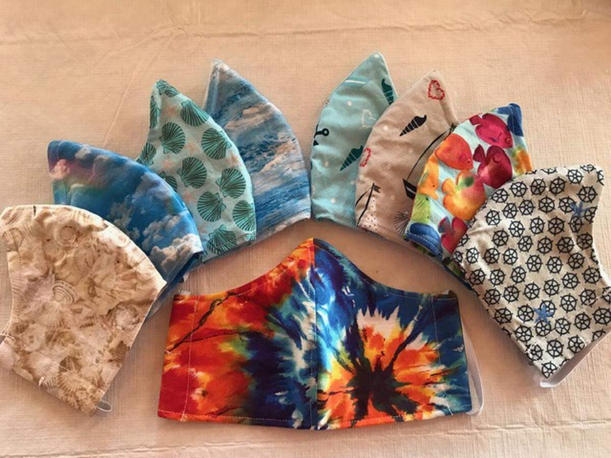 These are just a few of the 200 or more masks seamstress Karen Dean of Cambria has stitched up and donated to community members.