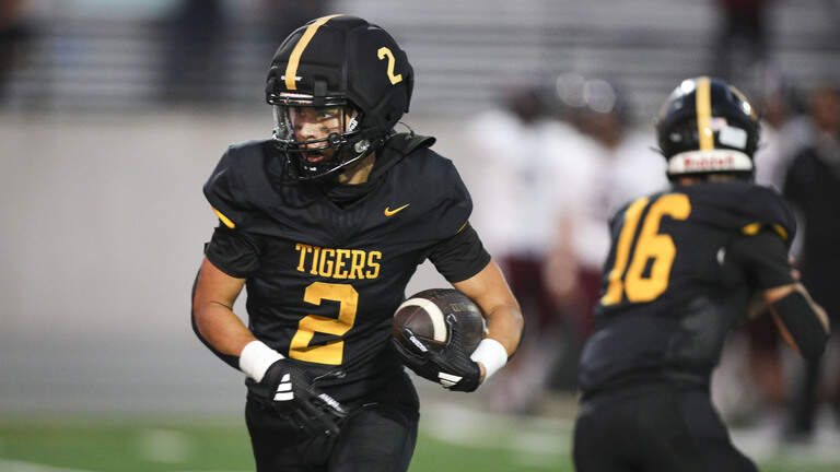 San Luis Obispo beats Mt. Whitney 14-0. See the photos