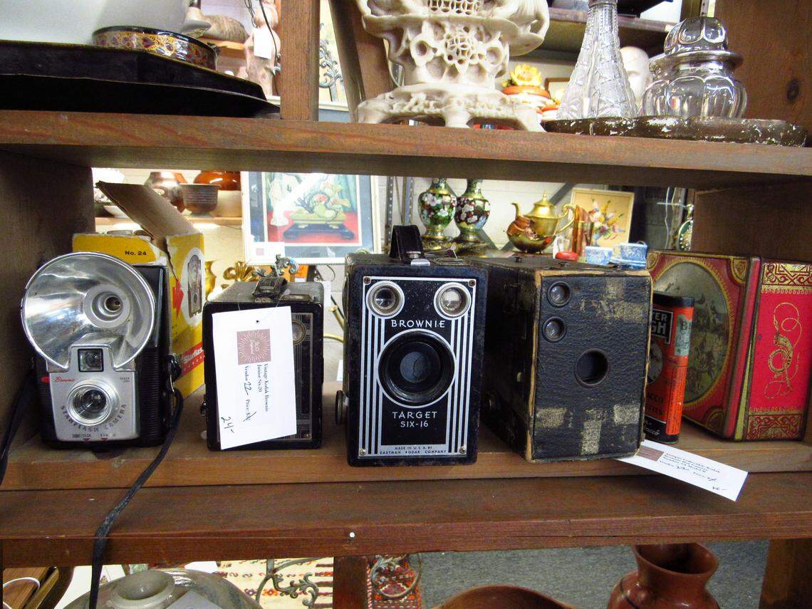 Collectible Kodak cameras sit on a shelf at new Monterey Street Vintage & Antiques, seen here Jan. 15, 2026.
