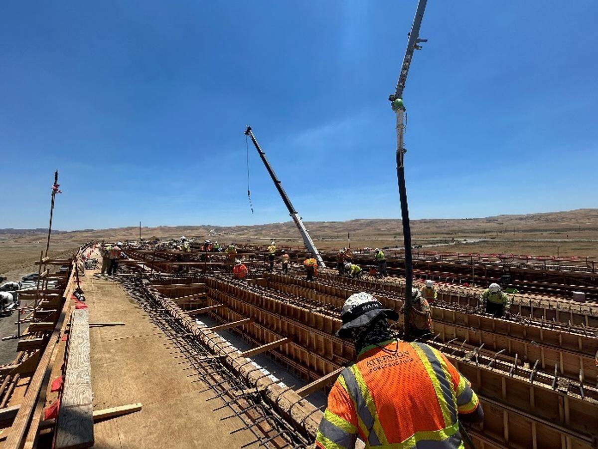 Construction workers build a pair of bridges stretching over Cholame Creek in northern San Luis Obispo County.