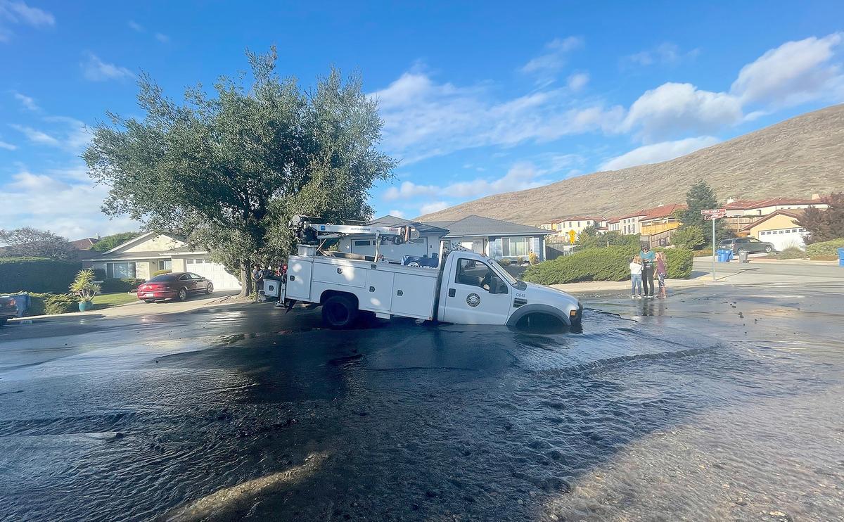 A City of San Luis Obispo truck got stuck in this sinkhole, which developed at the intersection of Calle Lupita and Calle Jazmin in San Luis Obispo on Wednesday, Nov. 2, 2022.