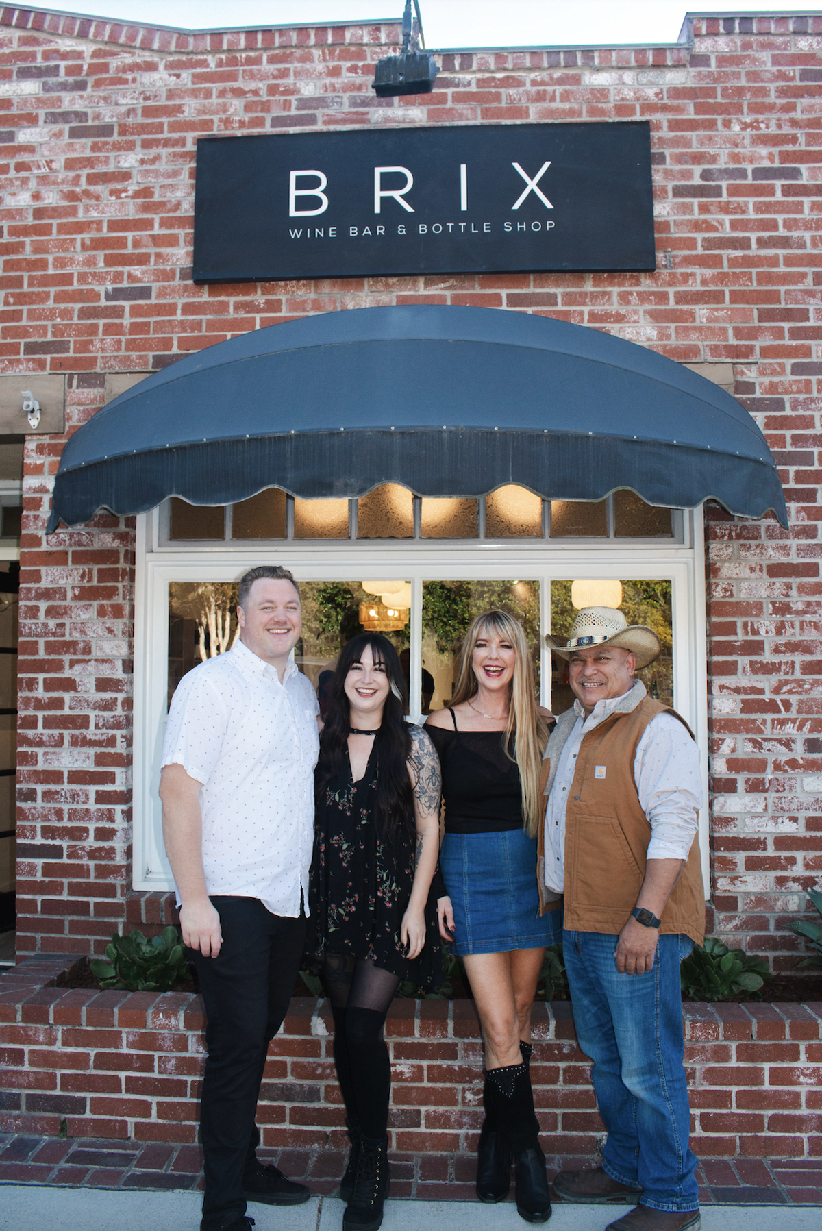 Brix Wine Bar and Bottle Shop co-owners from left to right: Nicholas Carrade, Mekynzi Sotello, Jasi Sotello and Gilbert Sotello.