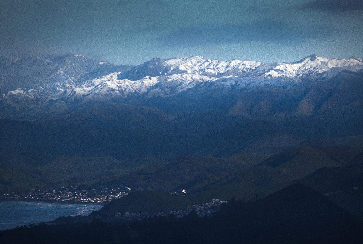 Lance Wilson shot this view of snow on the hills above Cayucos from Prefumo Canyon in San Luis Obispo on Thursday, Feb. 23, 2023.