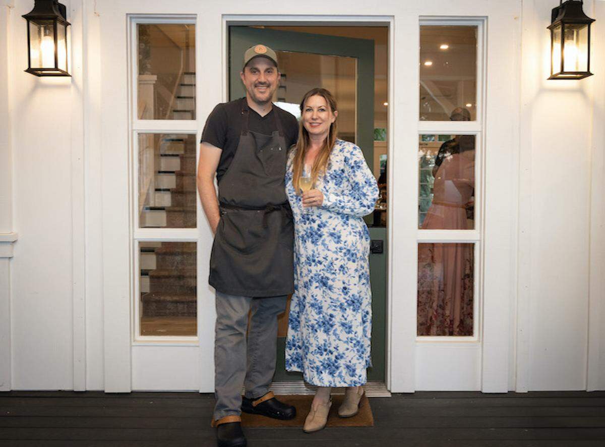 Justin and Julie Fischer pose for a photo outside their new restaurant Grace & Rose in Paso Robles. The farm-to-table eatery opened Aug. 1, 2025.