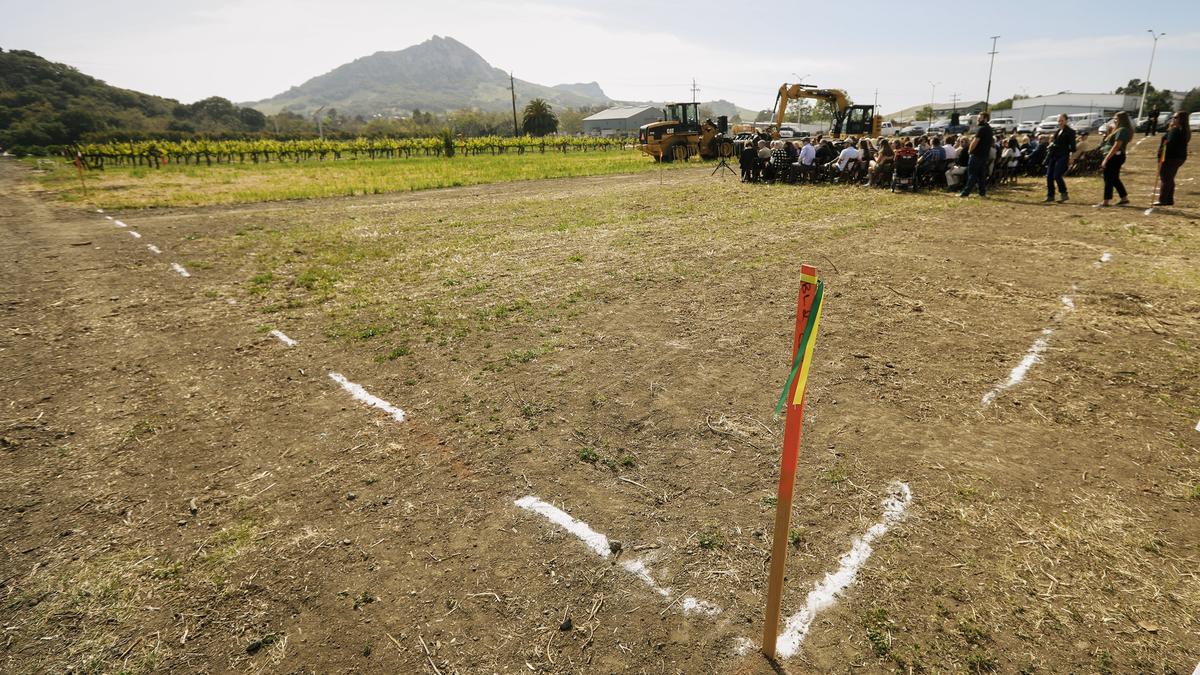 Stakes and chalk lines mark the future home of Cal Poly's Center for Wine and Viticulture during a groundbreaking ceremony Friday, May 4, 2018. The center is anticipated to open by fall 2019.