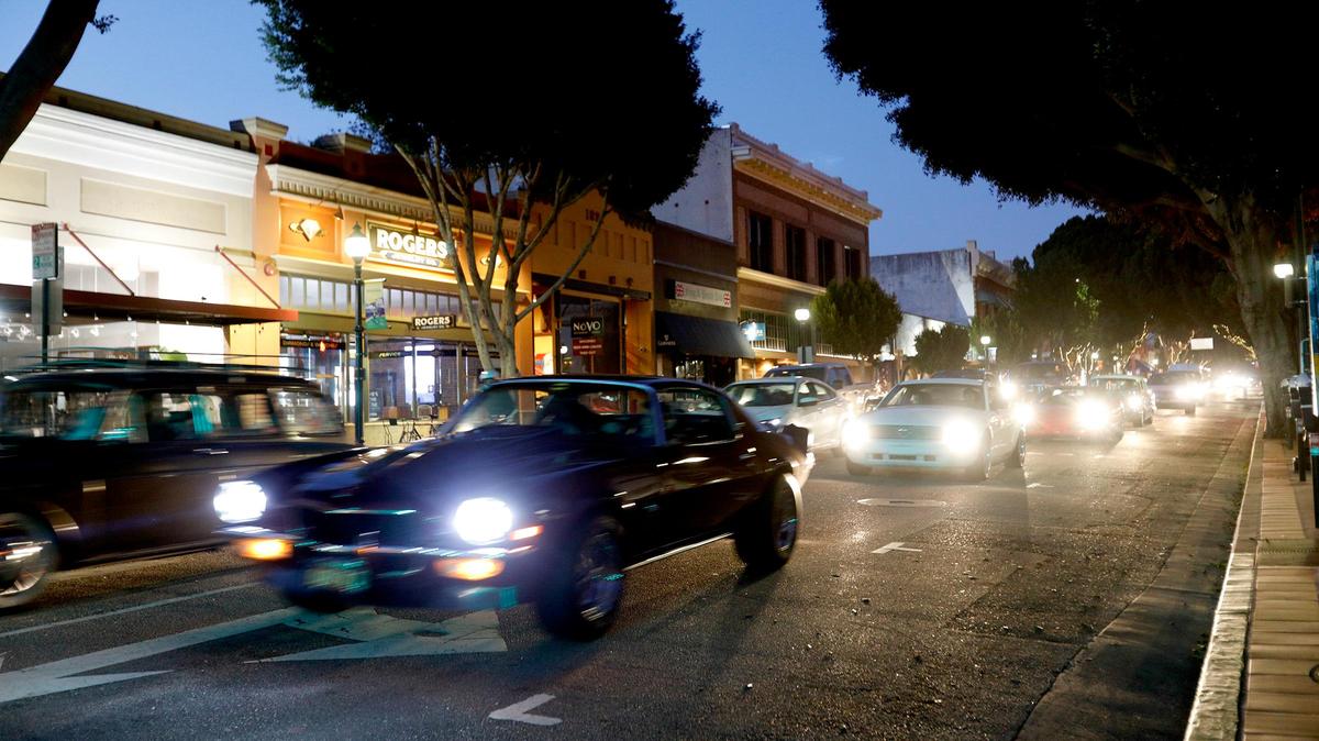 Two San Luis Obispo friends, Cavin Stokes and Nick Cano, organized a “coronavirus-conscious” cruise in downtown SLO in 2020.