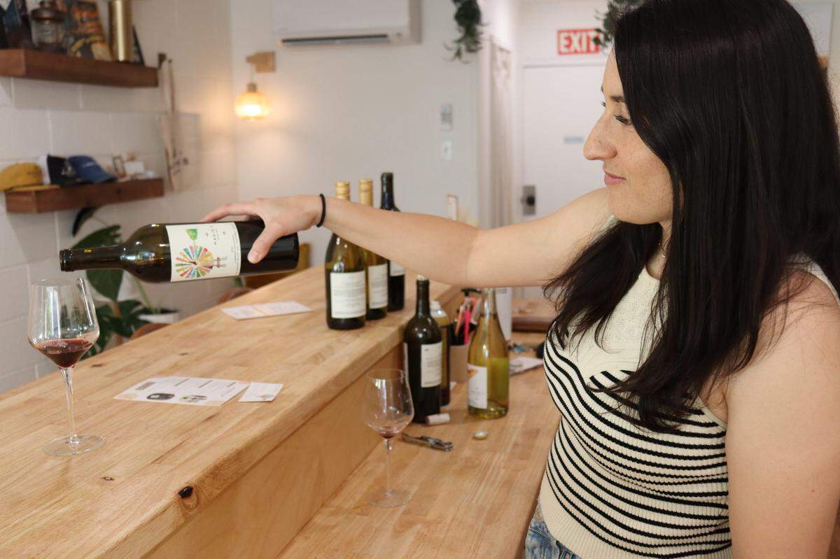 Marin Wolgamott, the owner of Marin’s Vineyard, pouring a glass of the label’s 2021 malbec in the winery’s new downtown Atascadero tasting room, which opened at 5983 Entrada Ave. in August 2024.