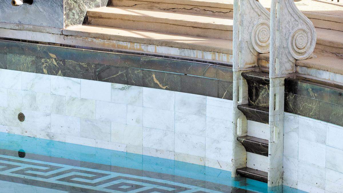 Hearst Castle’s Neptune Pool is no longer being filled in an effort to save water. The shallow end of the pool had dipped below the ladder in January 2014.