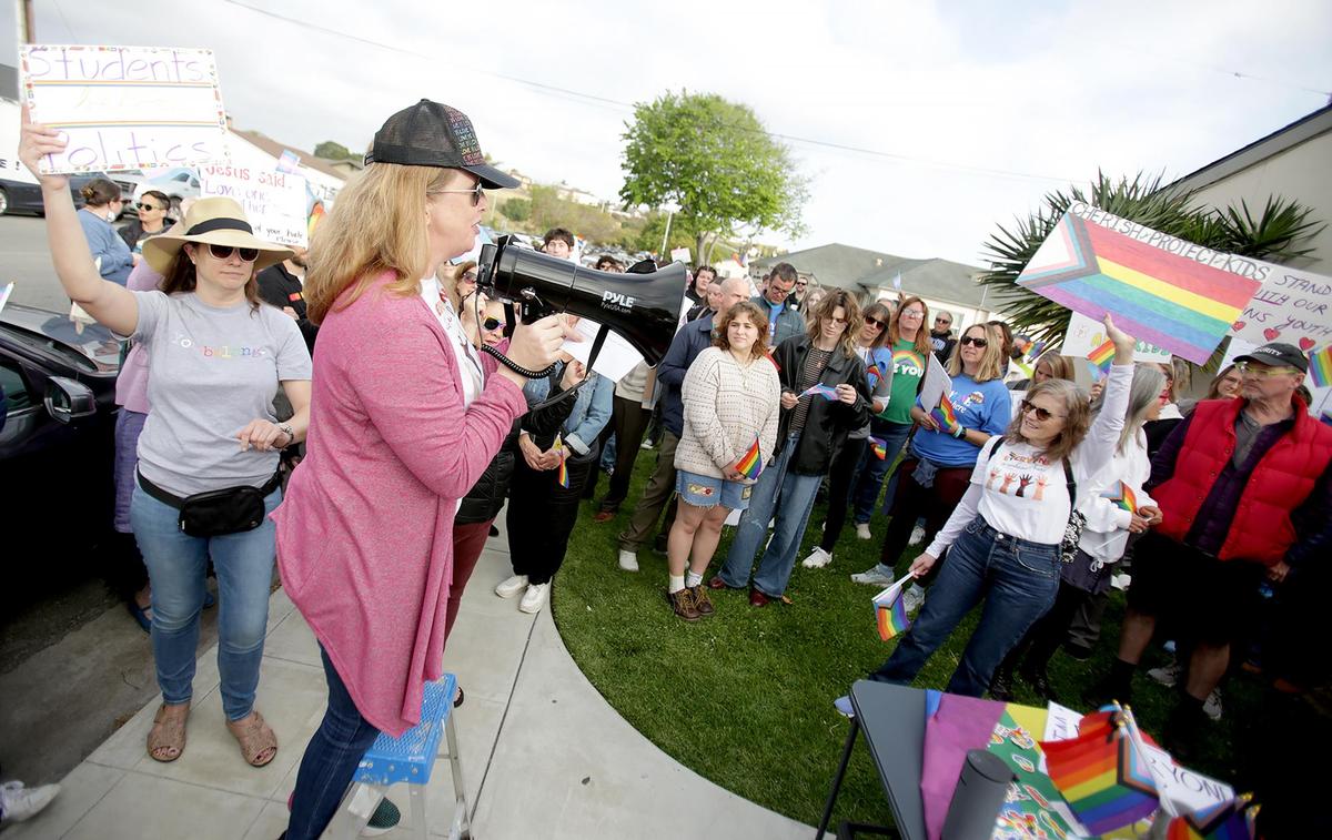 Virgina Roof, a member of the South County Democratic Club, rallied supporters of transgender students during a rally before the Lucia Mar Unified School District board meeting on May 6, 2025.
