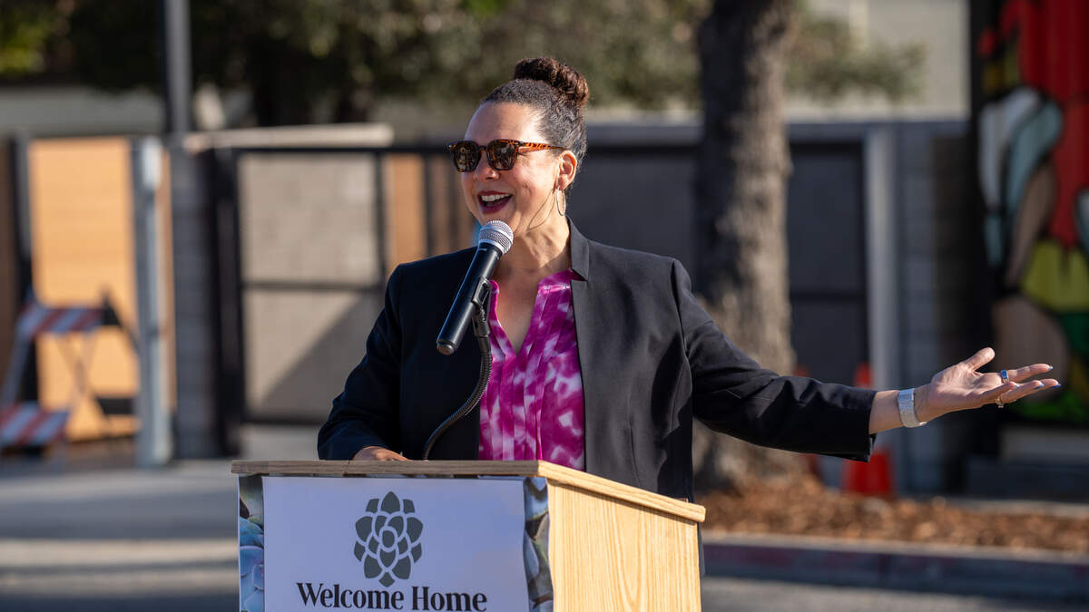 San Luis Obispo Mayor Erica Stewart speaks during the grand opening of the Welcome Home Village project on Monday, June 8, 2026. The project consists of 40 3D-printed permanent supportive housing units and 14 interim supportive housing units with wraparound supportive services onsite.