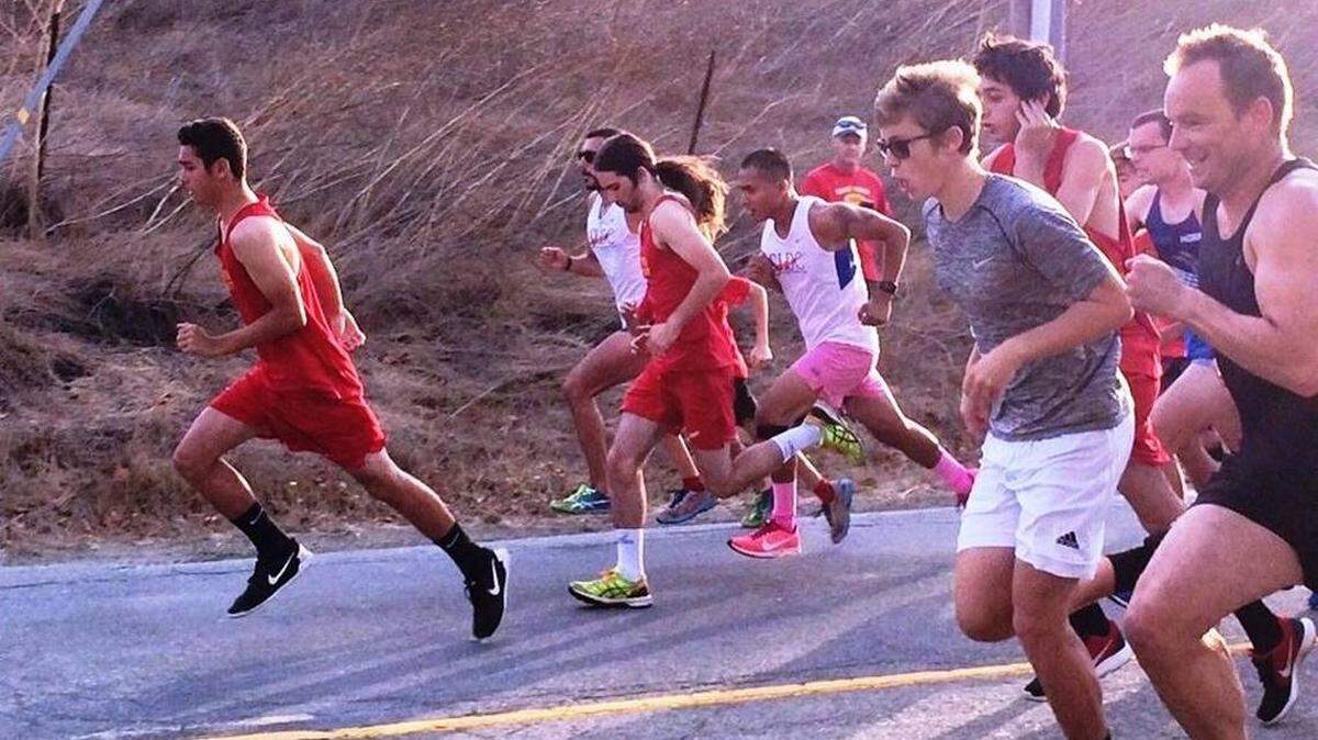 Senior cross-country standout David Amodei was named the Coast Union High School boys cross country MVP. Here, he jumps out in front of the pack at the 2018 Pinedorado 5K.