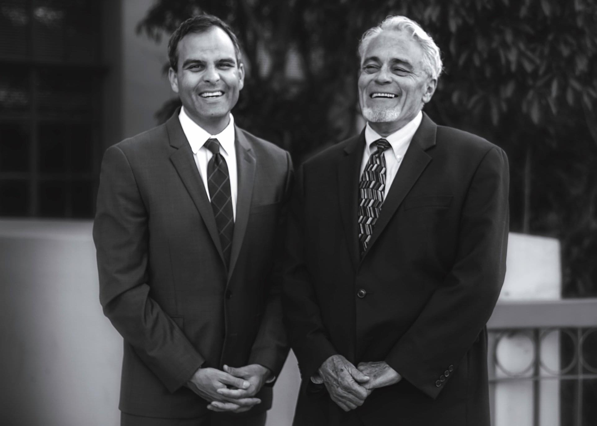 Patrick Fisher, left, with his father, David Fisher, in 2017. David Fisher, who practiced criminal defense for more than 40 years on the Central Coast and opened a practice with his son, died of a sudden medical emergency in 2018.