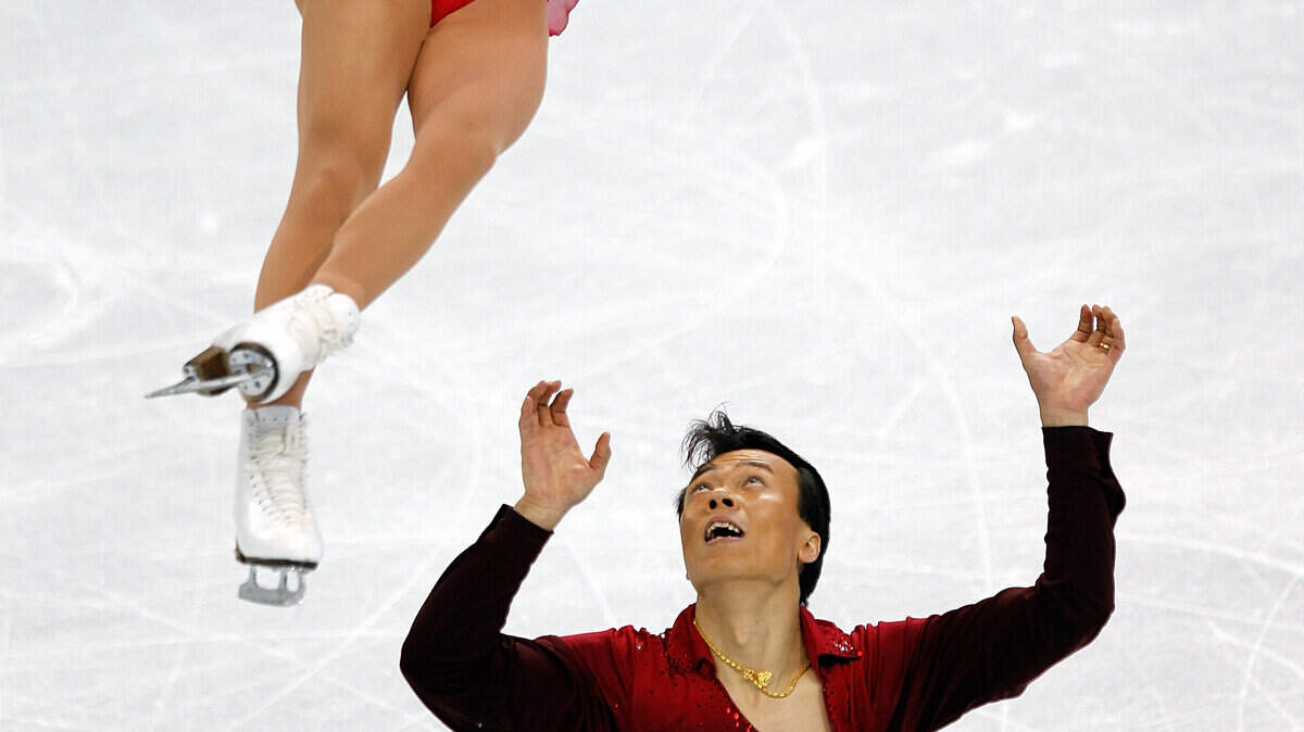 China's Hongbo Zhao and Xue Shen compete in the long pairs free figure skating program.  (Harry E. Walker / MCT)
