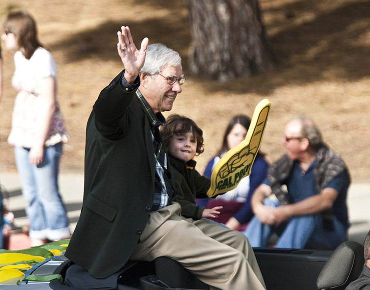 Warren Baker and his grandson Sully Baker ride in the Cal Poly open house parade on April 17, 2010.