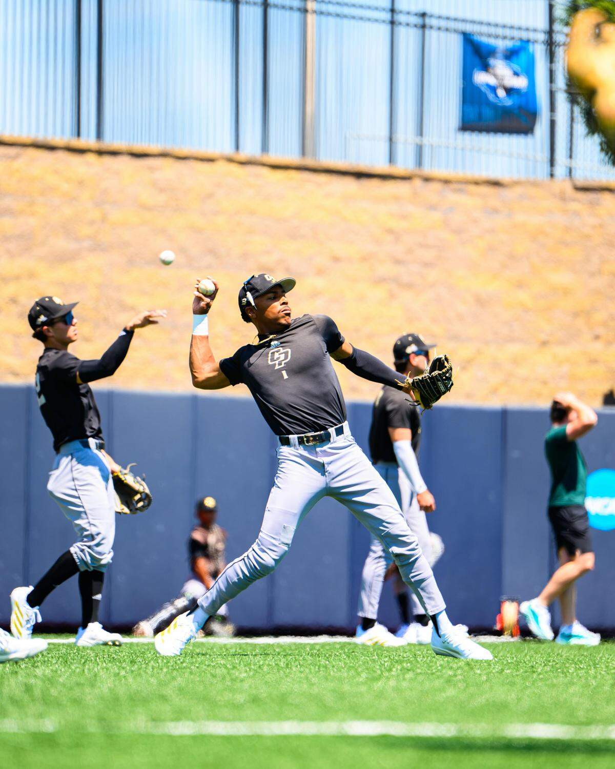 Cal Poly baseball players work out ahead of the team’s super regional matchup with West Virginia in Morgantown, on June 4, 2026.