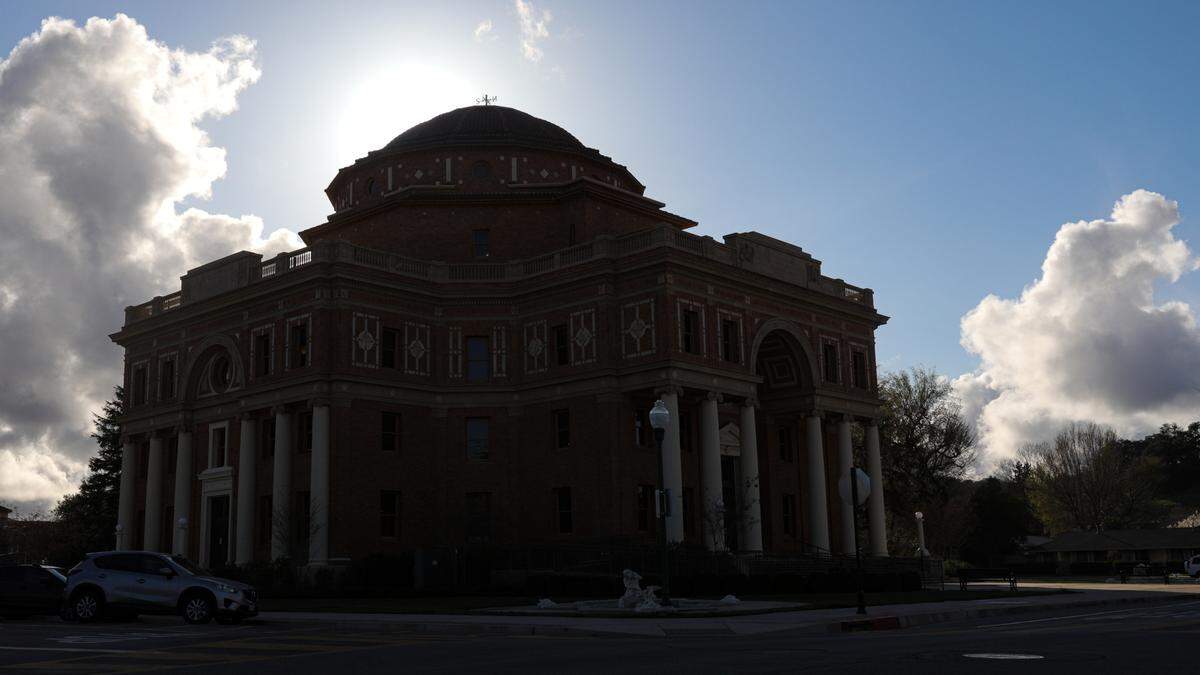Clouds roll into Atascadero as sun goes down behind the historic City Hall.