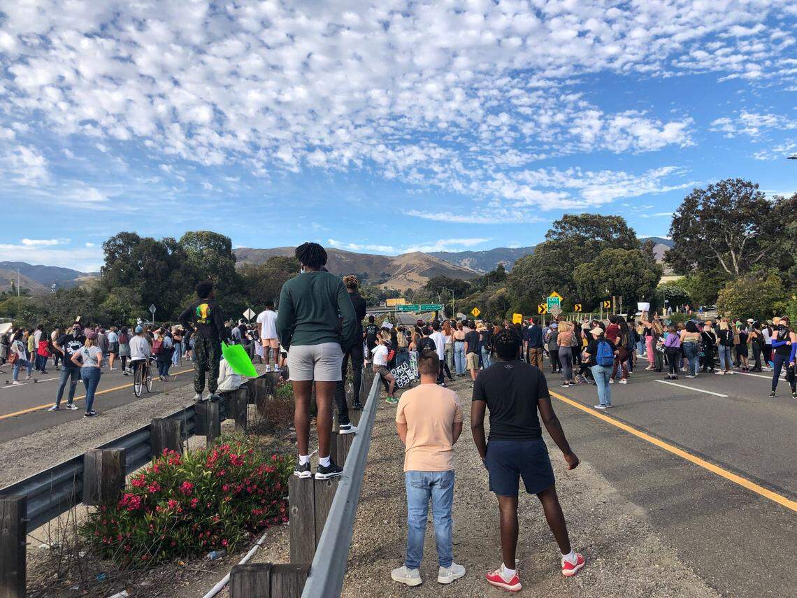 Protesters block traffic on Highway 101 on Tuesday, forcing the closure of all lanes in both directions.