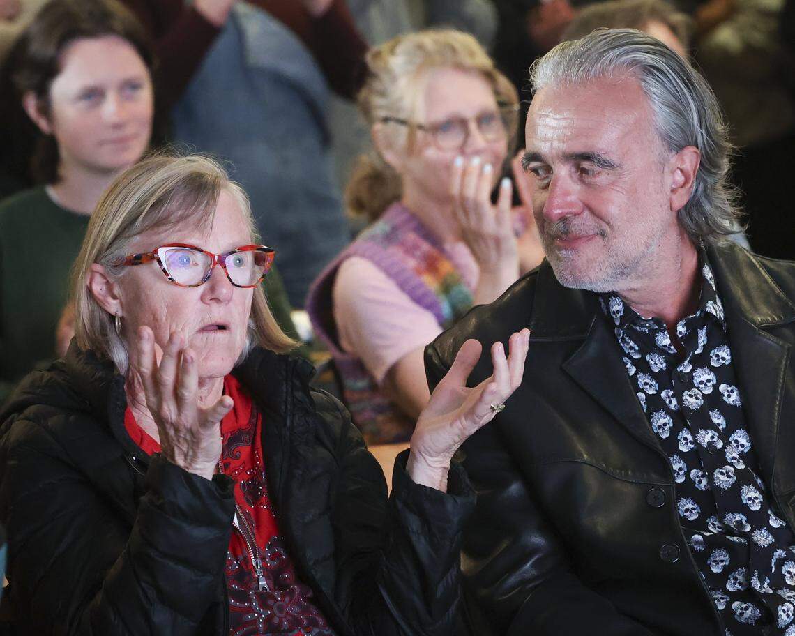 India D'Avignon, left, professor emeritus with the Cal Poly music department, registered a range of emotions as she sat with Ignatios Vakalis, former chair of the computer science department, and watched the splashdown of the Artemis II mission on April 10, 2026, at Cal Poly's University Union.