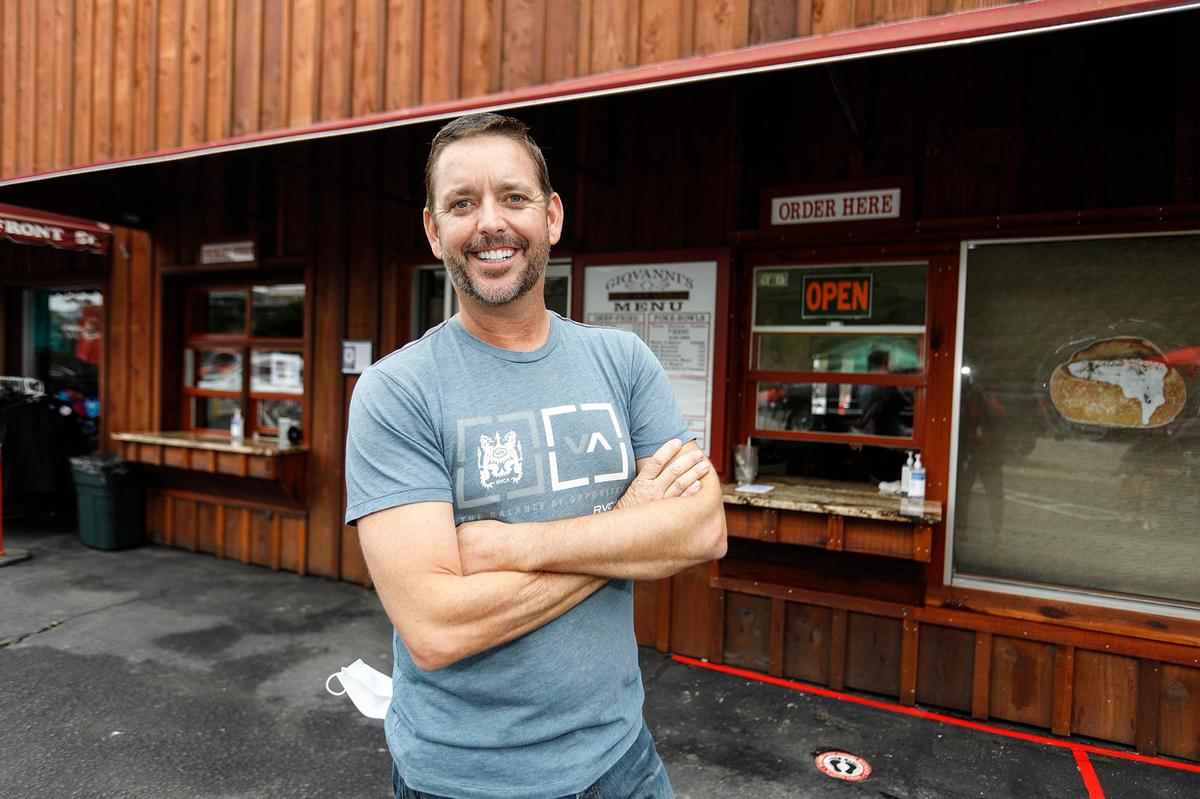 Giovanni DeGarimore poses for a picture in front of Giovanni’s Take-Out Express, located in the former home of The Coffee Pot restaurant in Morro Bay.