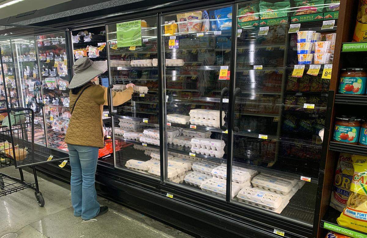 A shopper checks out the selection of eggs for sale at Vons, 3900 Broad St. in San Luis Obispo, on Monday, Jan. 13, 2025.