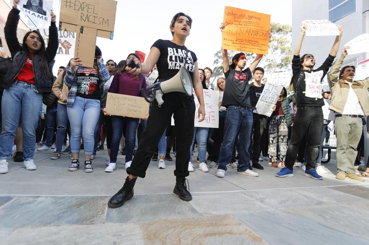 Students marched around campus Friday at the Cal Poly Open House Day of Action protest in response to the fraternity blackface/gangster photos. Students began marching from the parking lot at Slack Street and walked through campus, stopping at the University Union Plaza and the Recreation Center.
