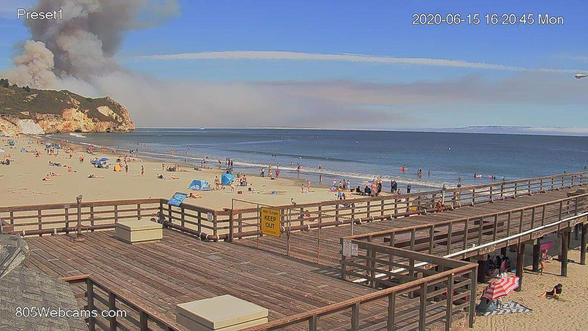View of beach in Avila Beach as a fire burned nearby in Shell Beach.
