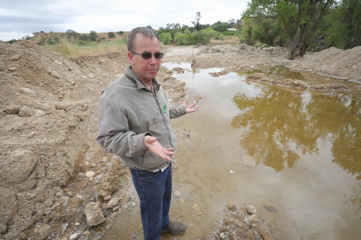 On May 9, 2023, four months after his son disappeared, Brian Doan stands near a spot along San Marcos Creek where search dogs alerted earlier this year. He would like to resume the search for Kyle, who was swept away in floodwaters on Jan. 9, 2023, and is requesting help from the San Luis Obispo County Sheriff’s Office.