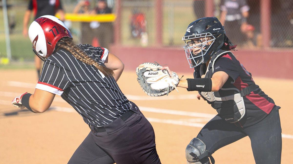 Nipomo catcher Madeline Hageman tags out Page Abeyta. After trailing all game, the Nipomo Titans beat the Fallbrook Warriors 9-8 in in the first round of the Division V CIF Southern California Softball Championships.