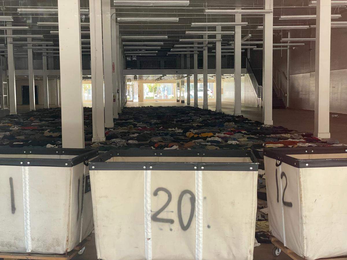 The inside of the vacant Beverly’s Fabric & Craft on Higuera Street appears to have a new tenant in Thrifty Beaches, a curated vintage clothing and furniture store in downtown San Luis Obispo. On Aug. 16, 2024, clothing and bins could be seen through the window of the space.