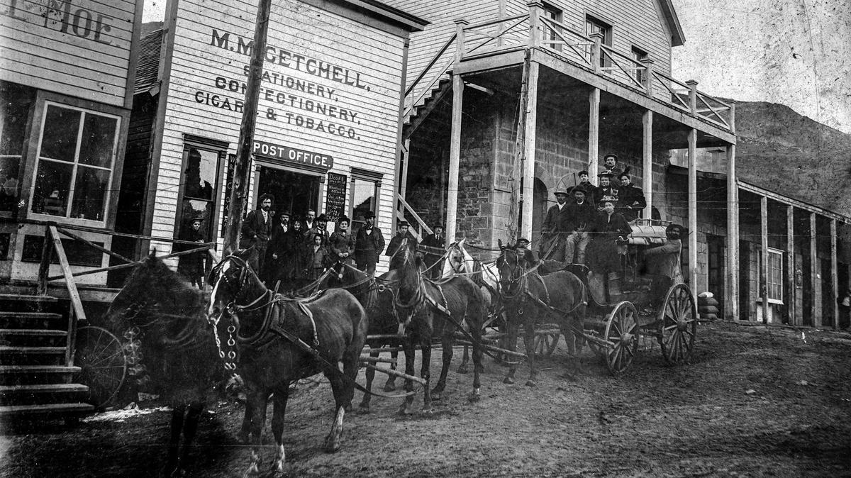 The chalkboard on the post office reads Oct. 16, 1897, as the town turned out to pose for a photo with the stagecoach in front of M.M. Getchell’s store and post office in Silver City, Idaho.