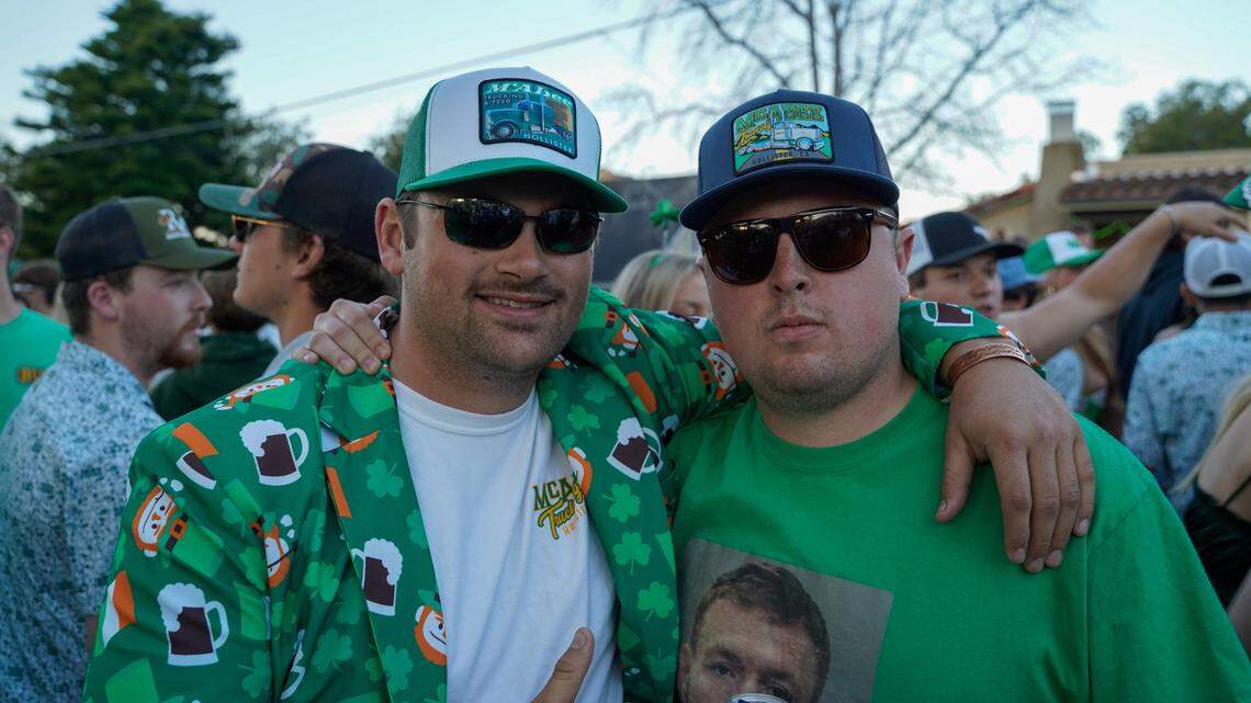 Fourth-year Cal Poly students Donnovan McAbee and Cole Cook pose for a photo at the St. Fratty’s Day party on Hathway Avenue near the university on March 16, 2024. A San Luis Obispo Police Department officer at the scene of the party estimated between 6,000 and 7,000 people in attendance.