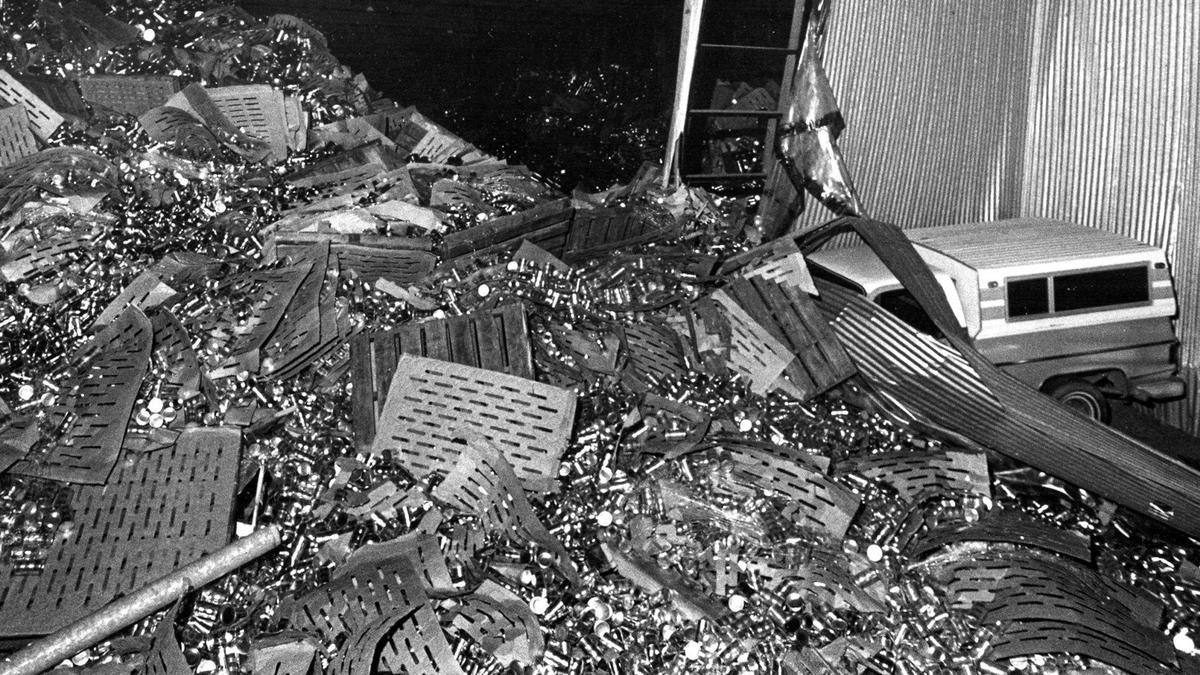 A car crushed when a tomato can warehouse collapsed damage in Hollister in the wake of the Loma Prieta Earthquake Oct. 17, 1989.