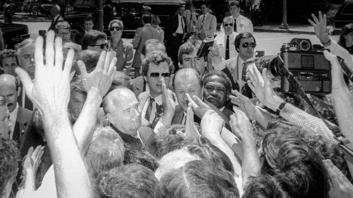 Amid a sea of hands, President of the Soviet Union, Mikhail Gorbachev visits Stanford University June 4, 1990.