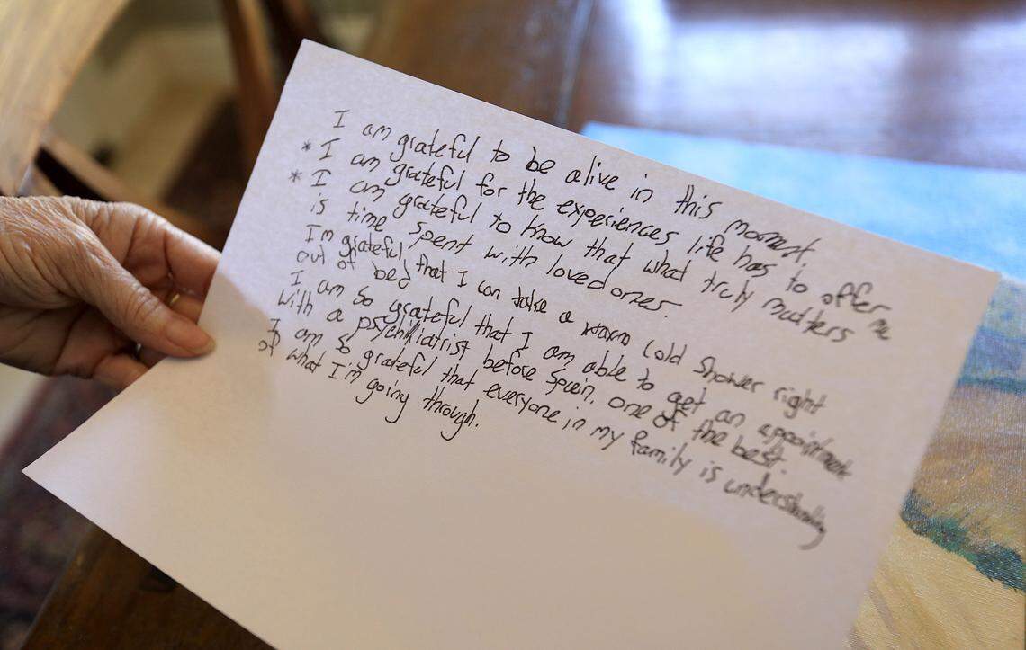 Lauri Strain reminesces about notes, a dairy and momentos. Strain has started a nonprofit, HOPE With IAN, to spread awareness and education about suicide and mental health.